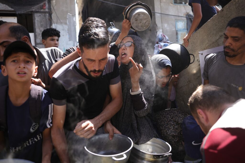 crowds gather food gaza palestine june 2025 afp