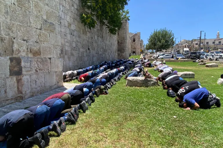 Muslims praying outside walls of Old City Jerusalem due to restrictions 3 1751533508