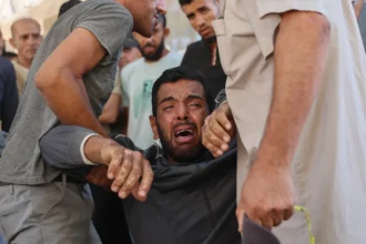 Palestinian cries shifa hospital gaza July AFP.jpg